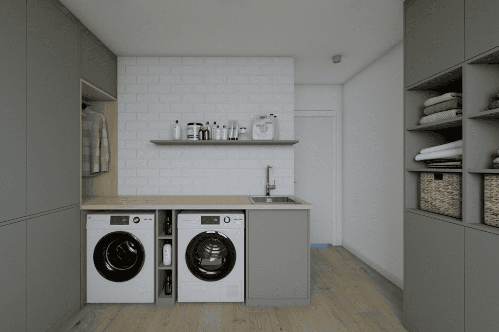 Efficient laundry area featuring tailored cabinets and modern washing machines.