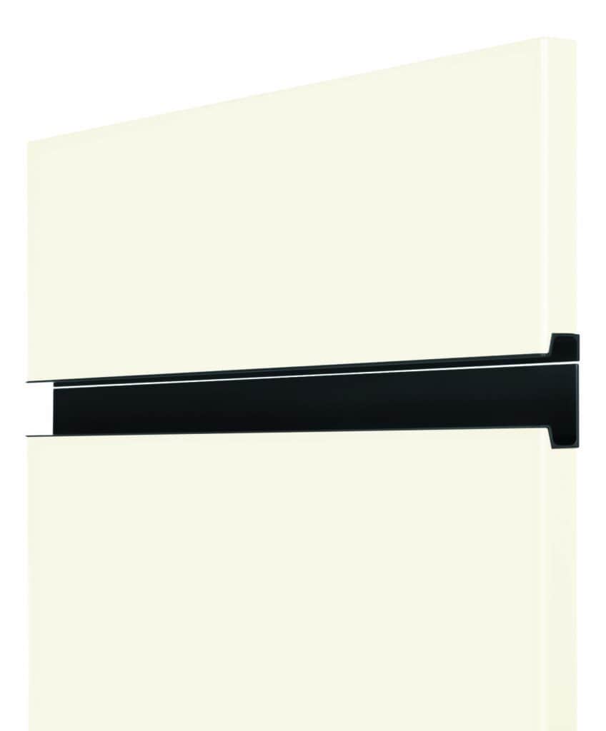 Modern white kitchen cabinet with black handle for custom interior design.