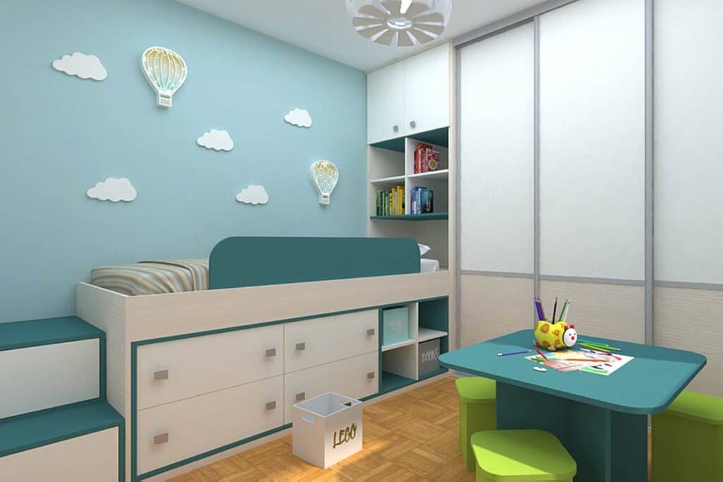 Child's bedroom furniture with playful cloud and hot air balloon decor.