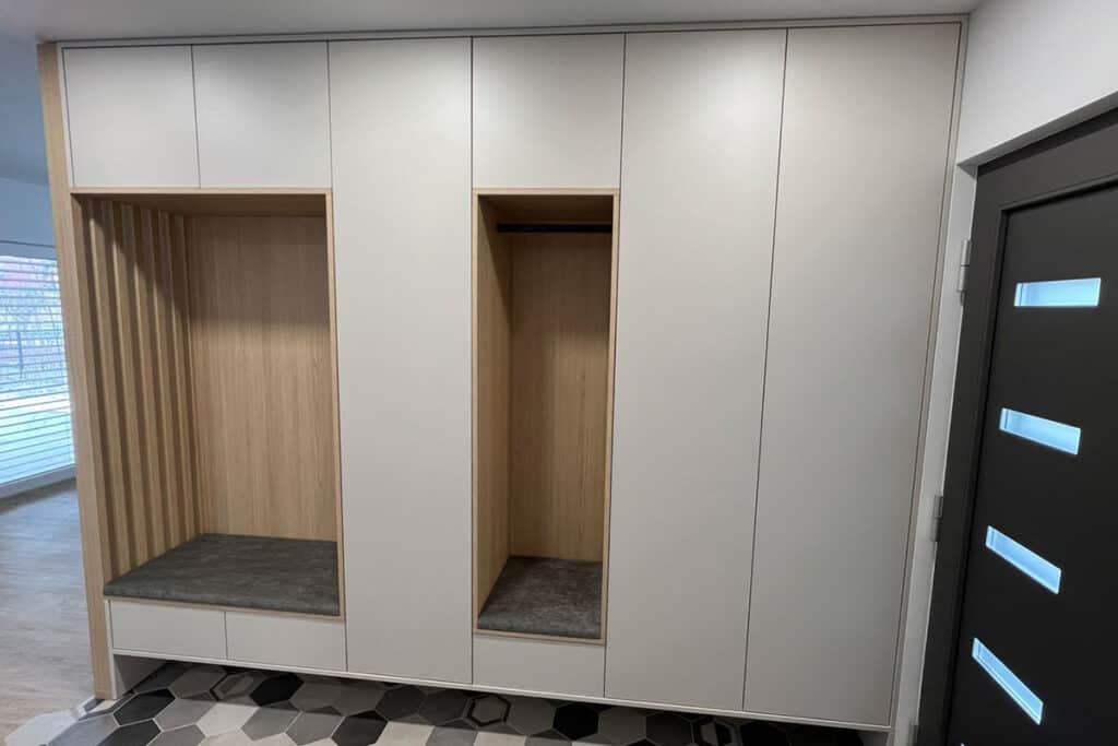 Custom hallway wardrobe with open niches and storage drawers for PREDSOBE.